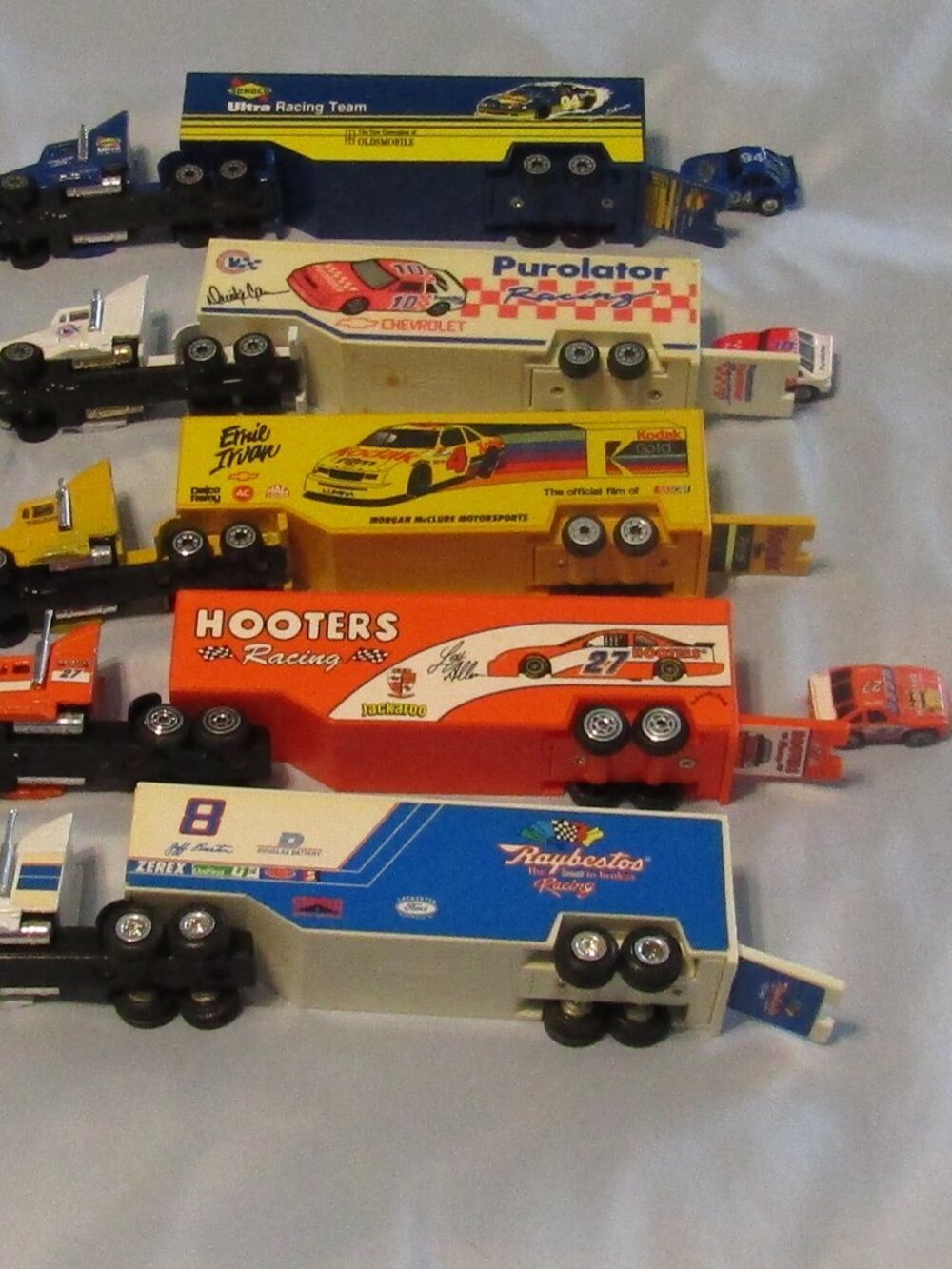 Lot 5 1990s RACING CHAMPIONS RACING NASCAR TRANSPORTER TRUCKS Hooters Kodak +++